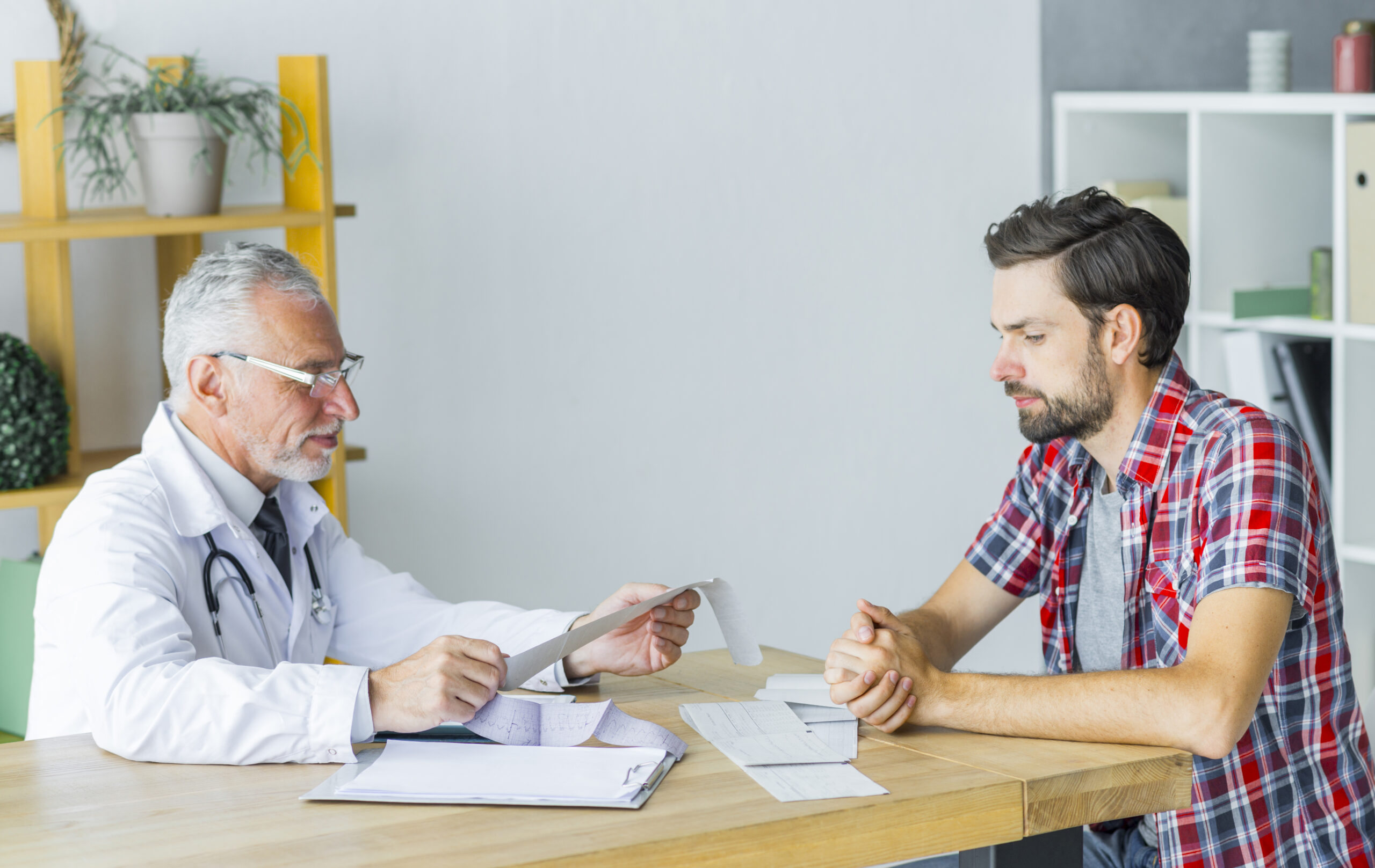 Image senior doctor talking with patient